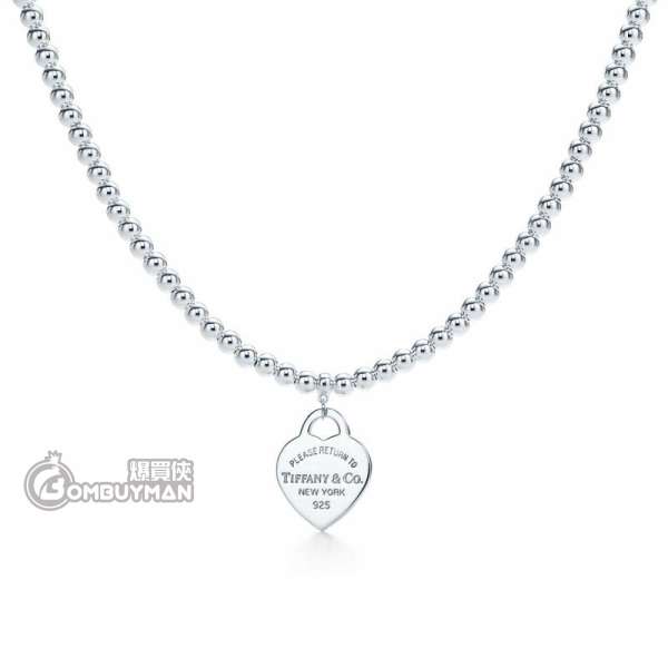 small heart tag in sterling silver on a 